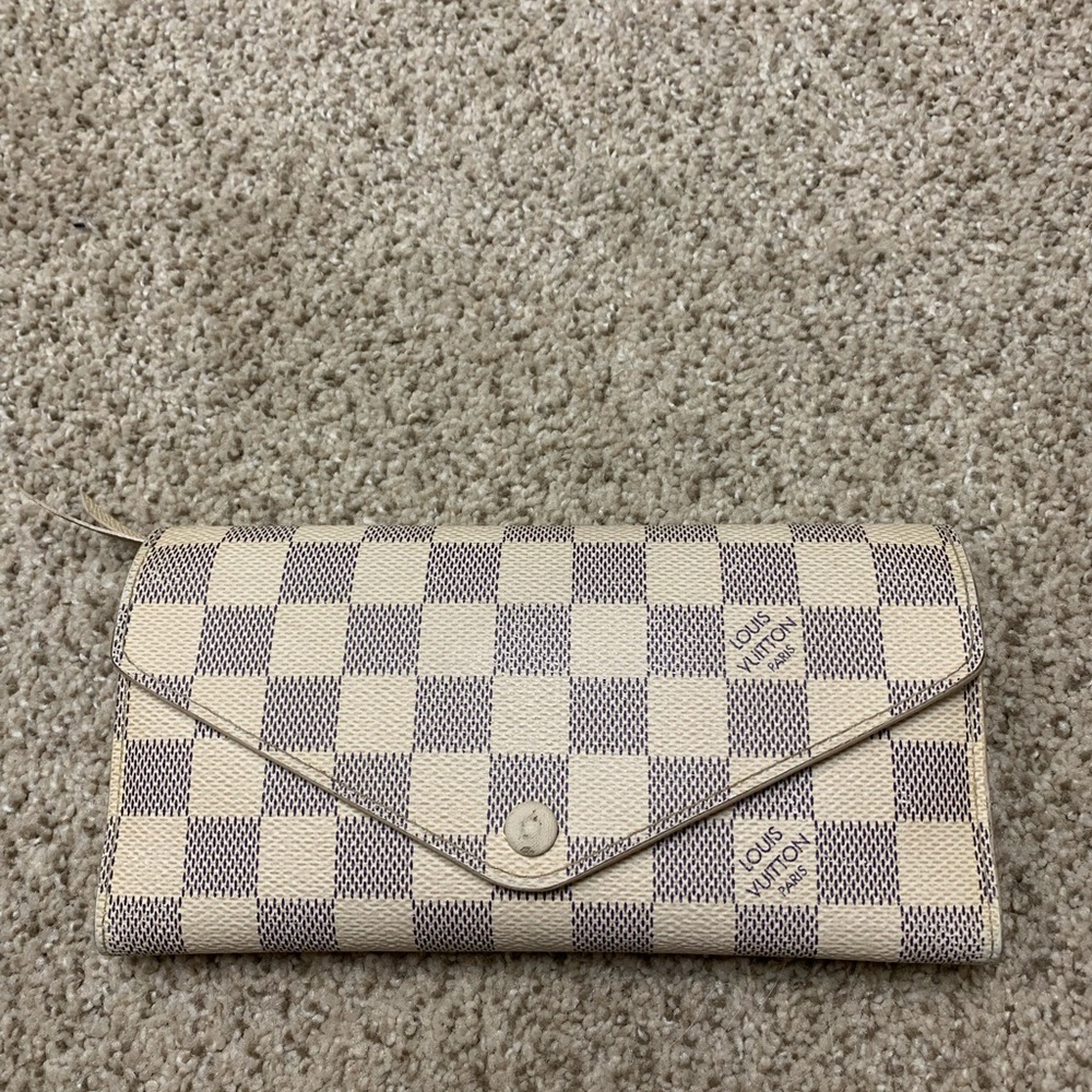 Louis Vuitton wallet.